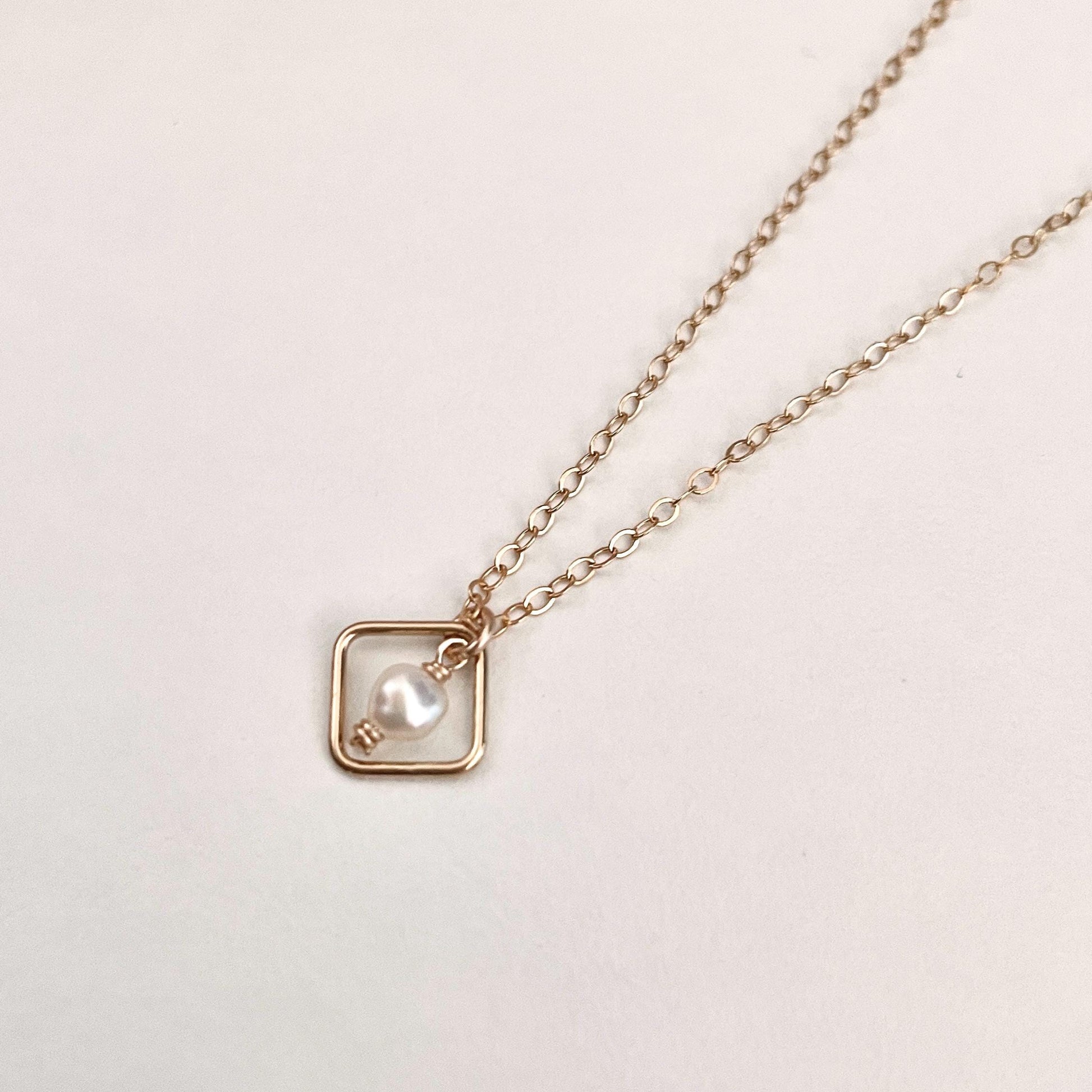 tiny framed freshwater pearl pendant necklace