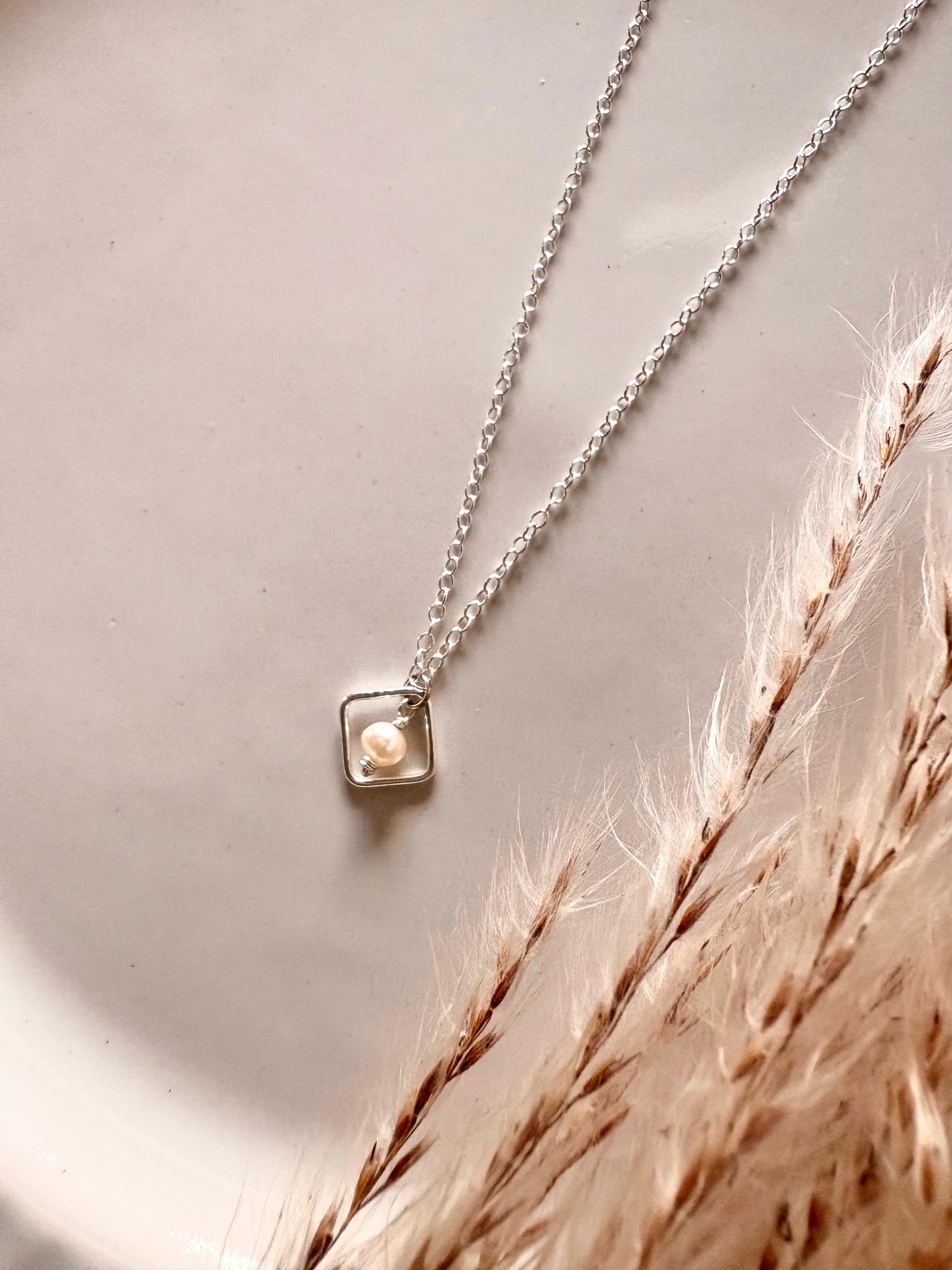 tiny framed freshwater pearl pendant necklace